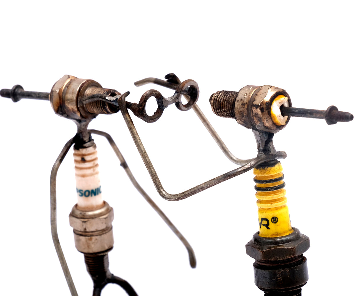 Zündkerzen Figur – Optiker